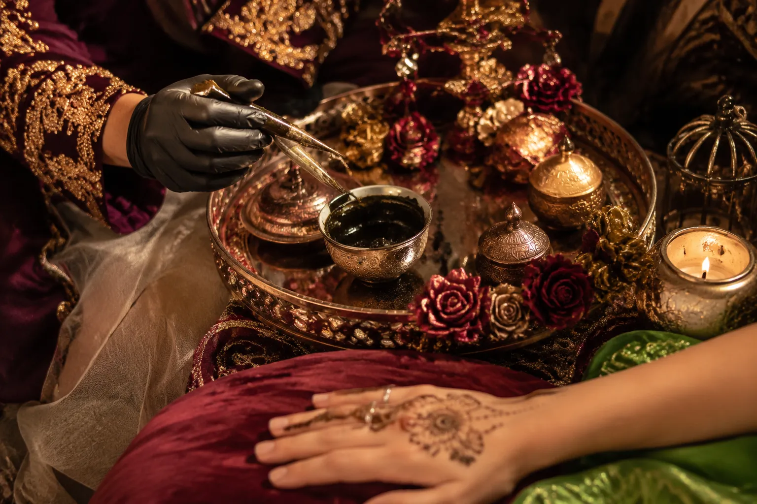 Henna application prepared on a decorated tray for a bride and guests