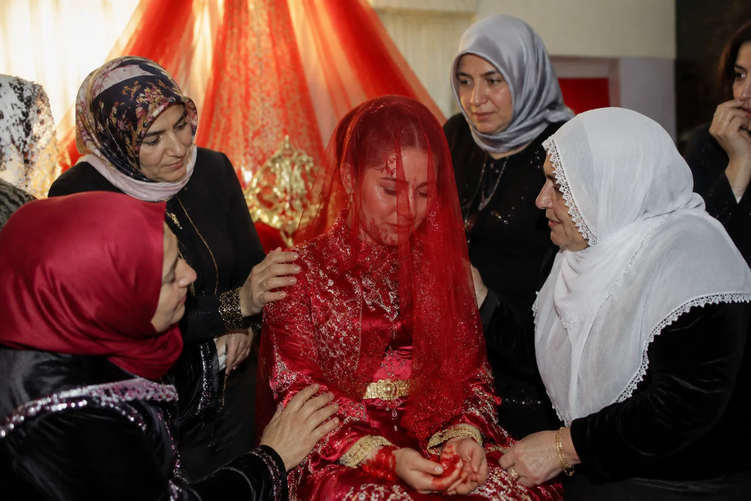 Bride and relatives gathered during an emotional Turkish henna night ceremony