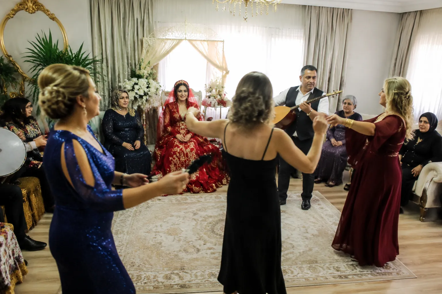 Guests returning to music and dancing after the henna ritual